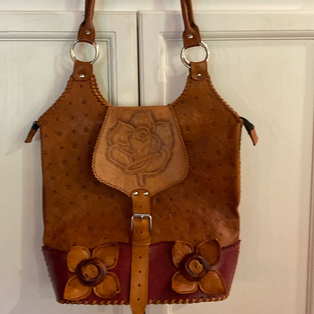 *Leather artisan purse unlined with small zippered pocket & zipper closure